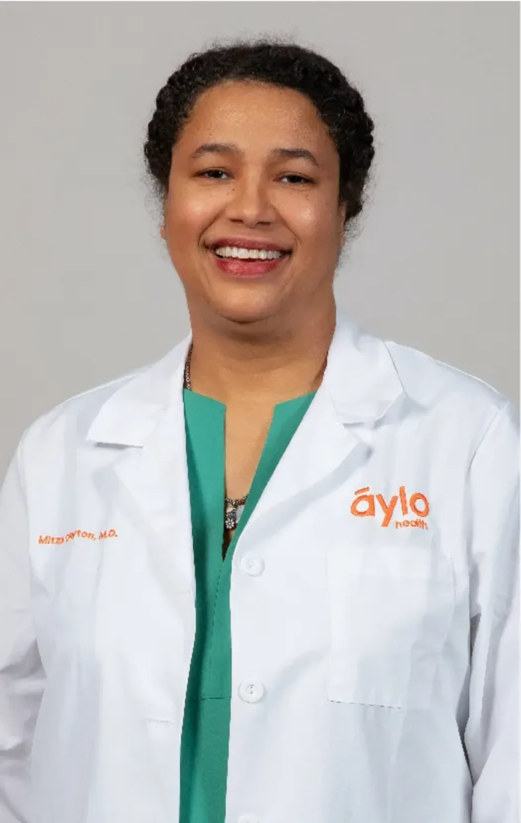 Dr. Mitzi Clayton, MD