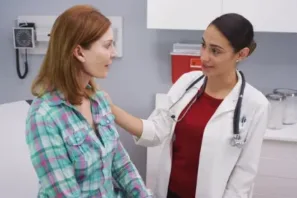 Aylo Nurse Practitioner checking in on a patient