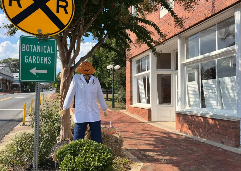 Image of Downtown Ball Ground featuring a scarecrow dressed as an Aylo Health provider.