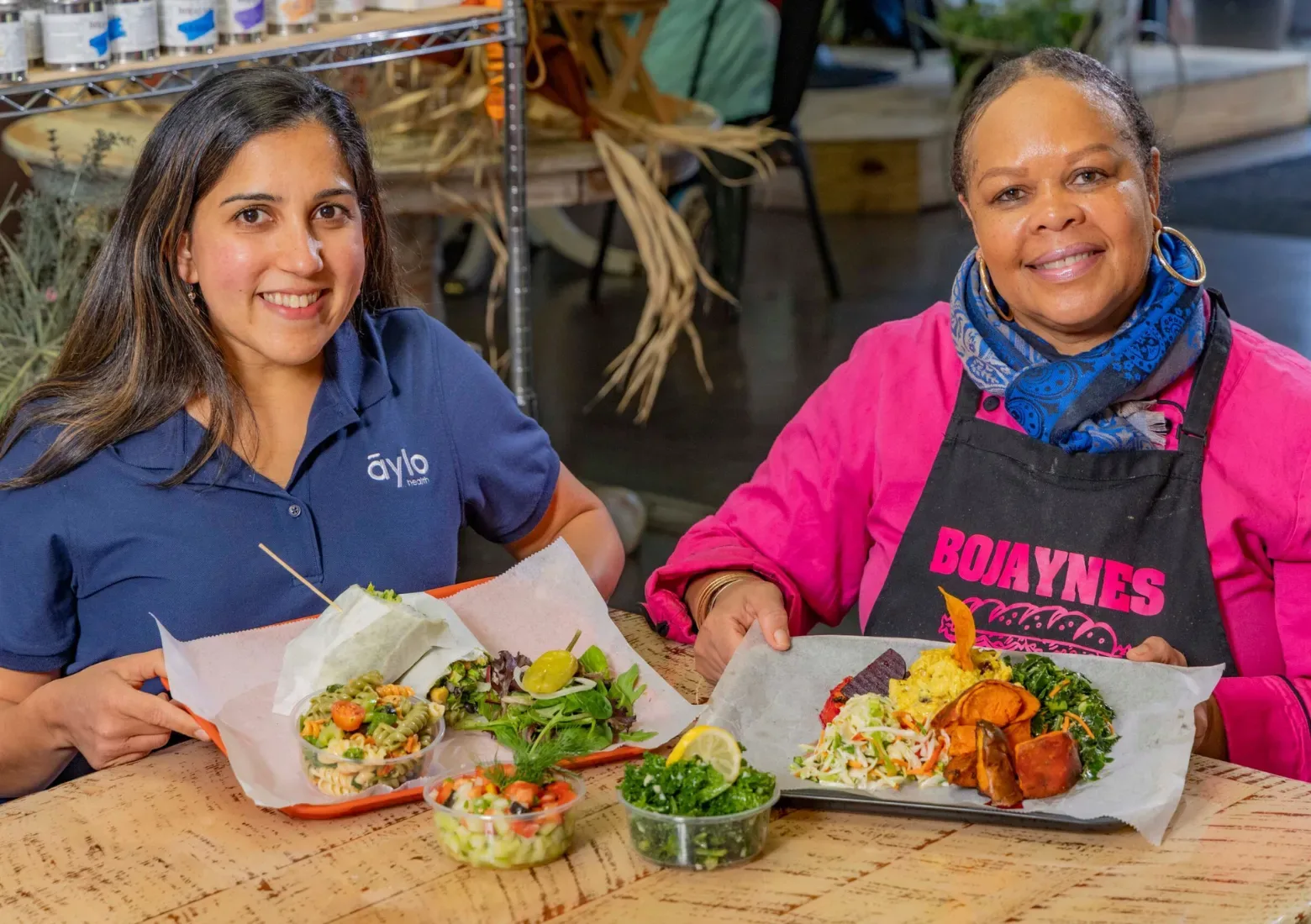 Dr. Shah and Owner of Bojaynes Enjoying Healthy Food